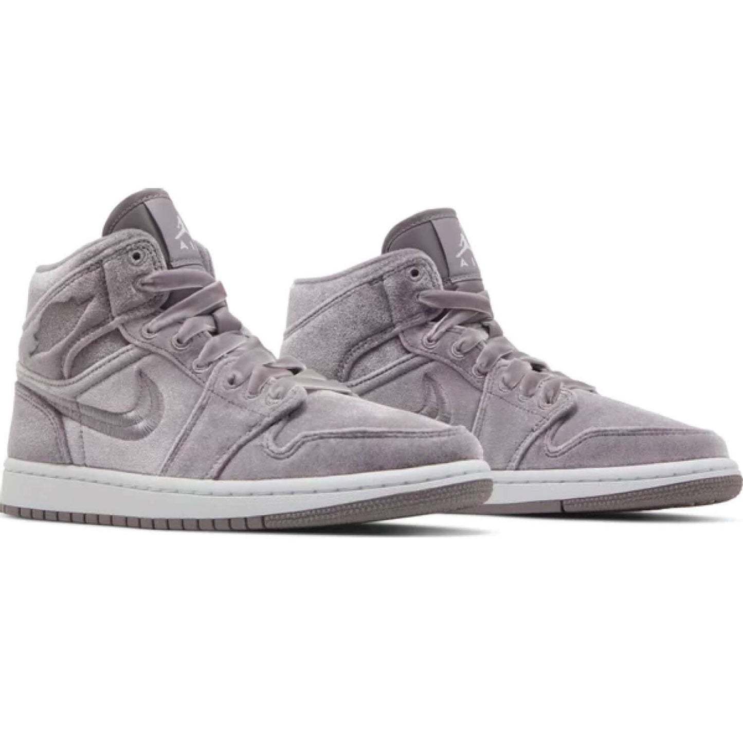 This is the pair of Wmns Air Jordan 1 Mid 'Purple Velvet'. Describe the beauty of Purple Velvet.