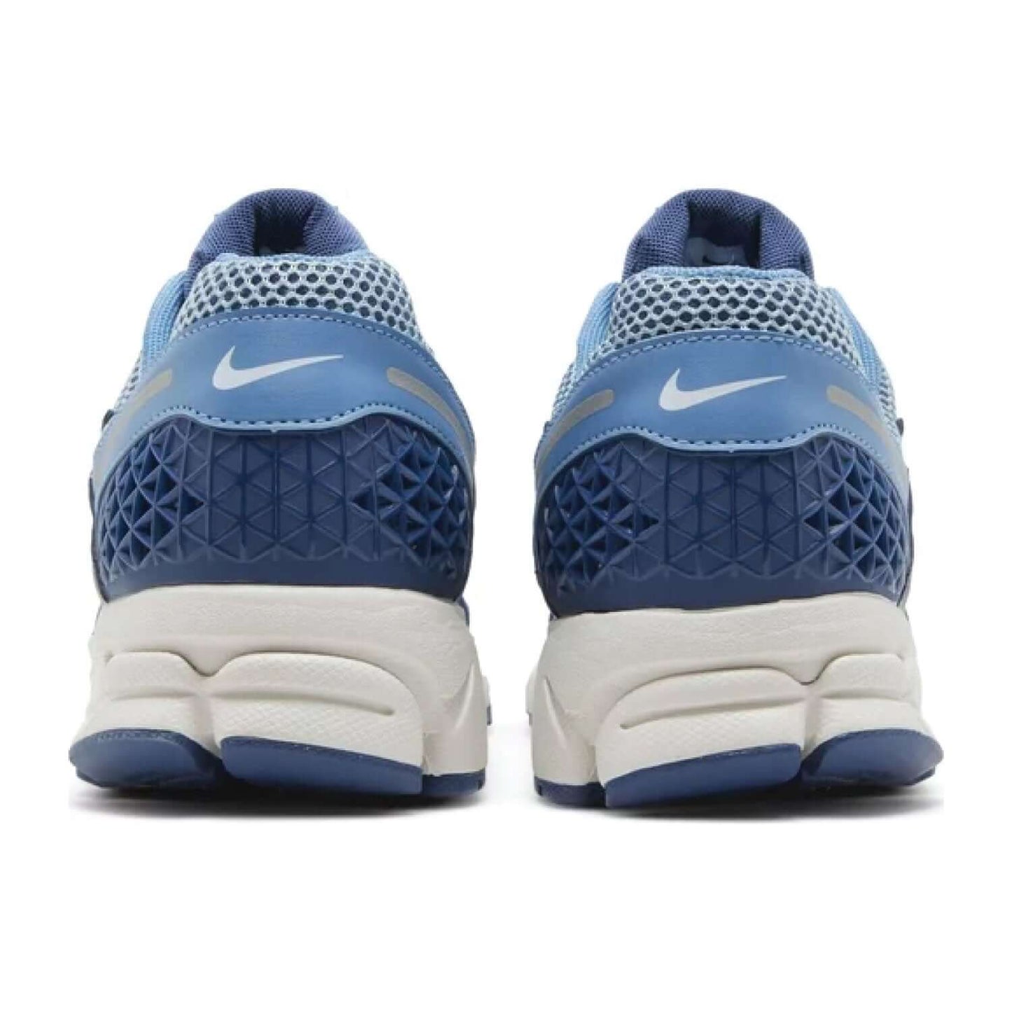 This is the back side shoe of Air Zoom Vomero 5 'Worn Blue'.