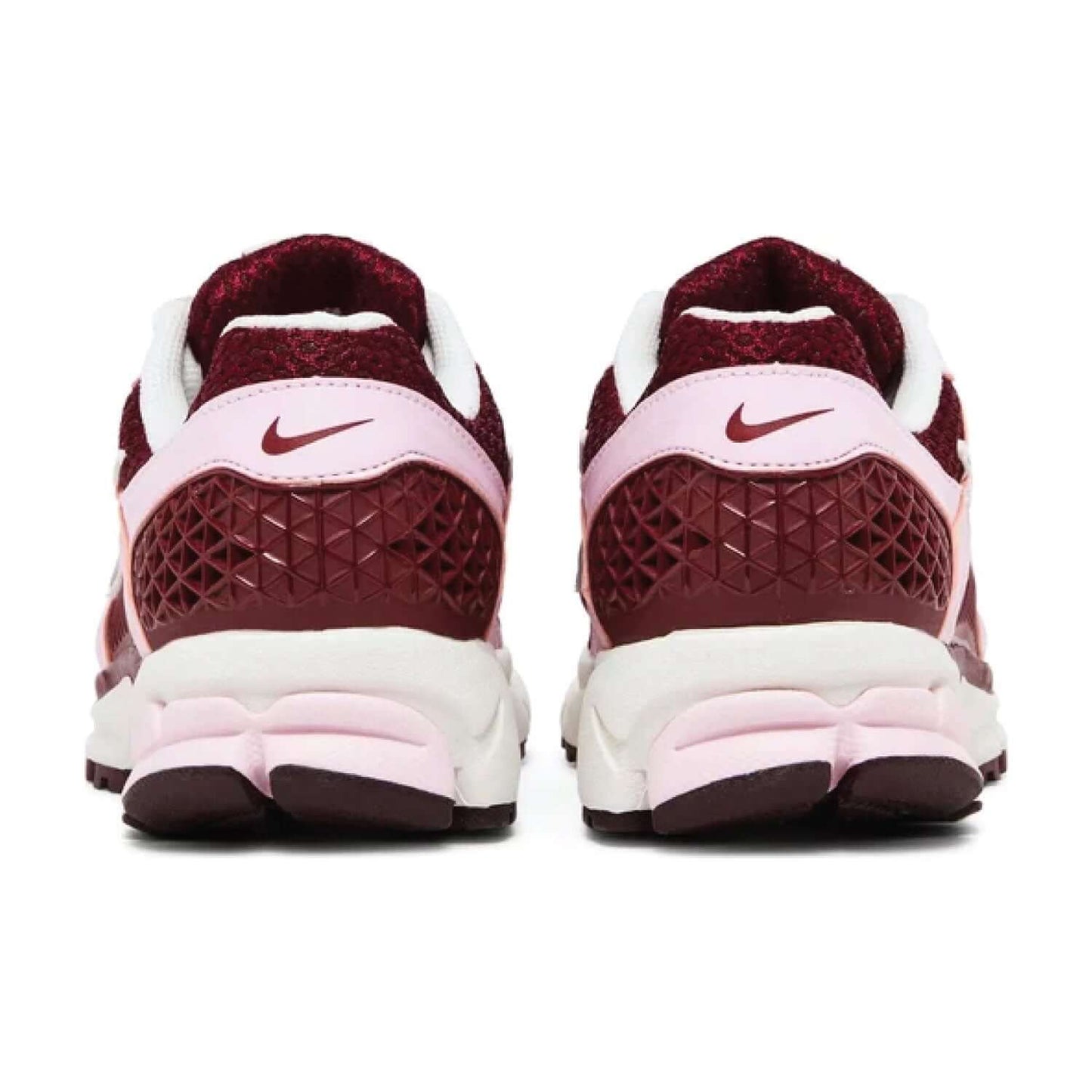 This is the back side shoe of Wmns Air Zoom Vomero 5 'Pink Foam Team Red'.