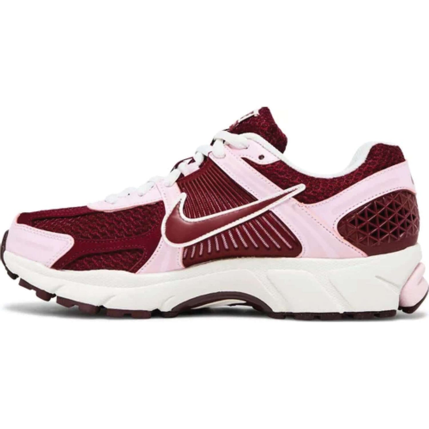 This is the left side shoe of Wmns Air Zoom Vomero 5 'Pink Foam Team Red'.