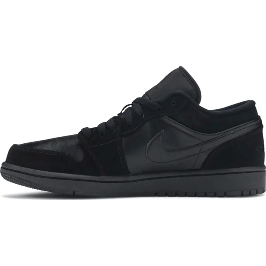 This is the left side shoe of Air Jordan 1 Retro Low 'Triple Black'