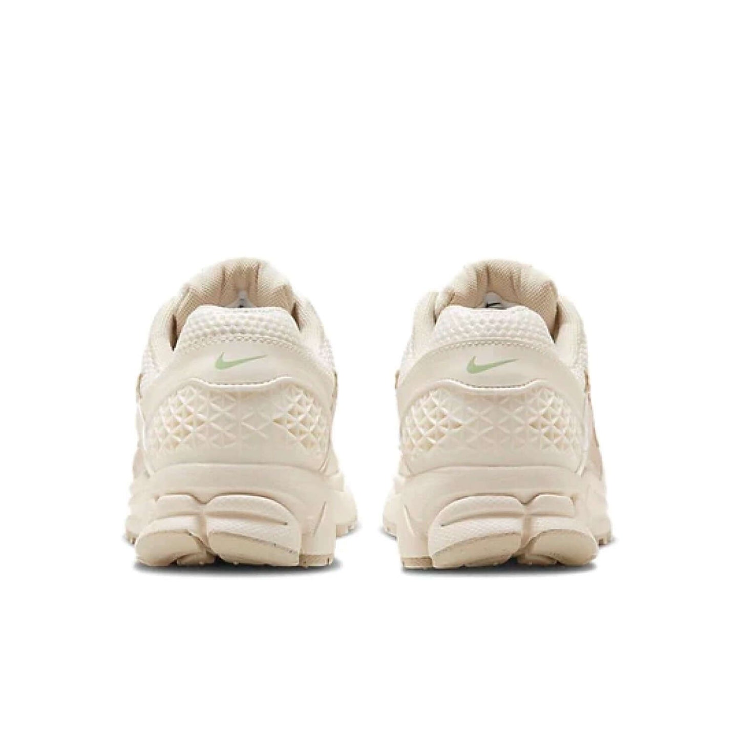 This is the back side shoe of Wmns Air Zoom Vomero 5 'Sail Light Orewood Brown'