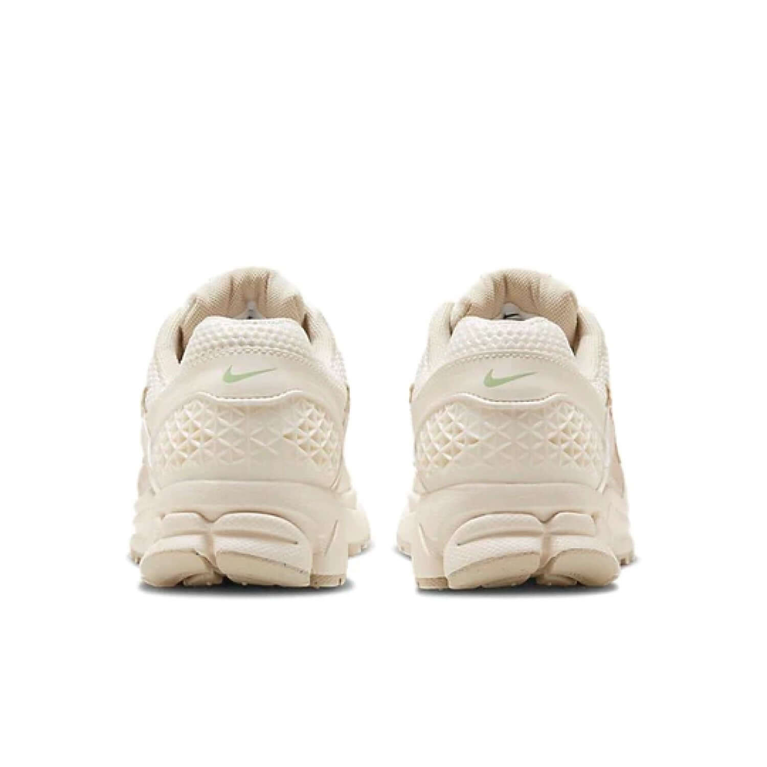 This is the back side shoe of Wmns Air Zoom Vomero 5 'Sail Light Orewood Brown'
