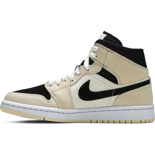 This is the left side of Wmns Air Jordan 1 Mid 'Barely Orange'