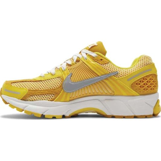 This is the left shoe of Zoom Vomero 5 'Yellow Ochre'.